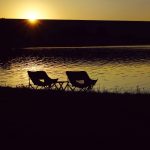 Relaxing at Lake Ogallala at sunset
