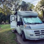 Reading by the creek at Elkhorn Creek Campground, KY